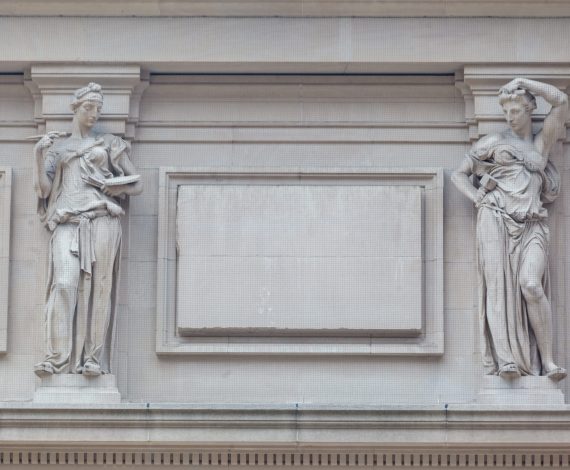 Details of the classic greek sculptures on the facade of the Metropolitan Museum in Manhattan, New York City
